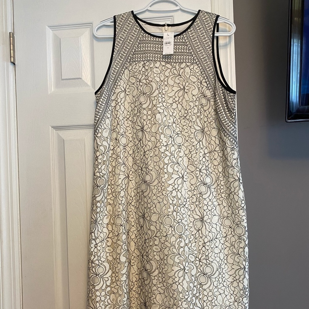 Ivory and black lace dress